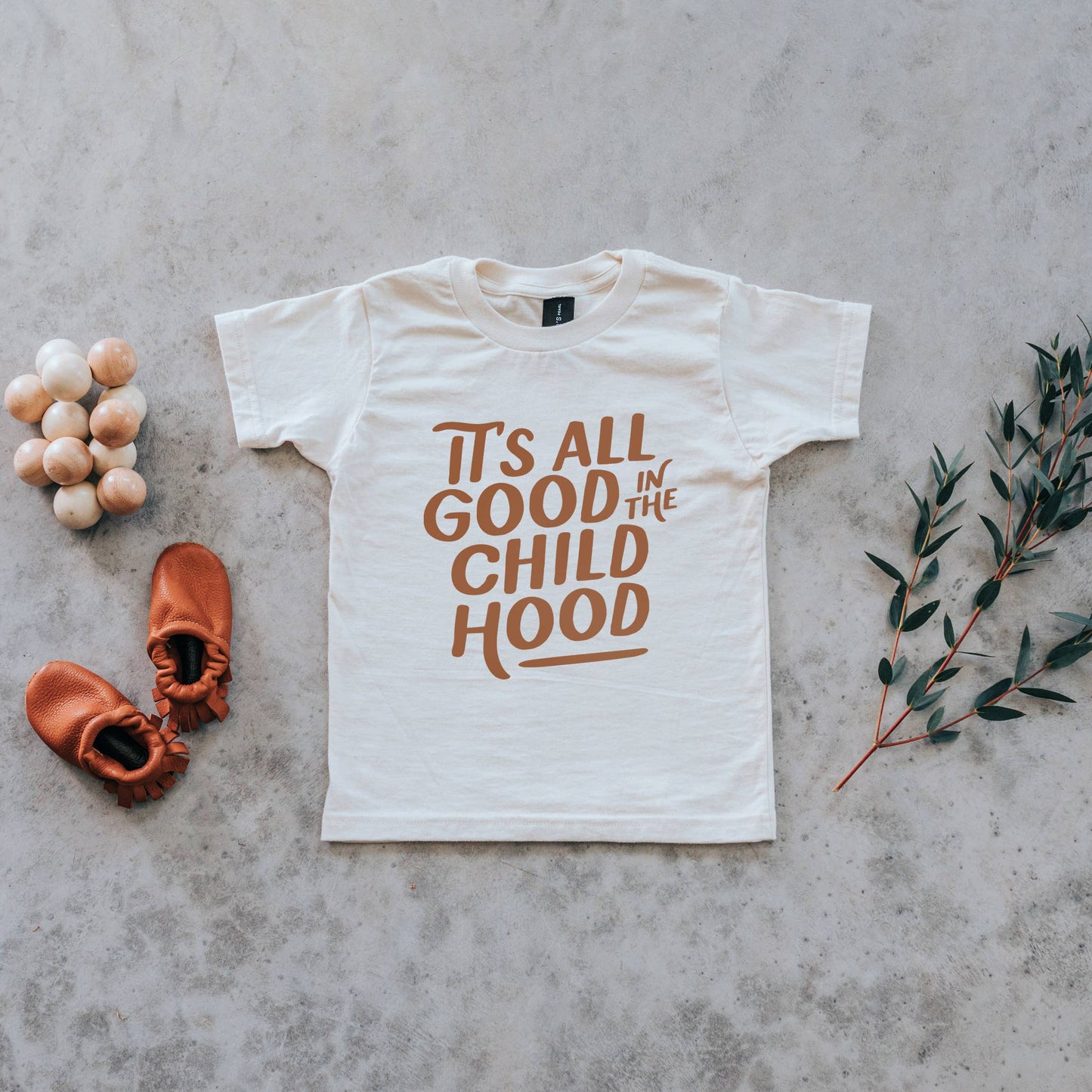 It's All Good in the Childhood Organic Kids Tee: Youth Small / Camel